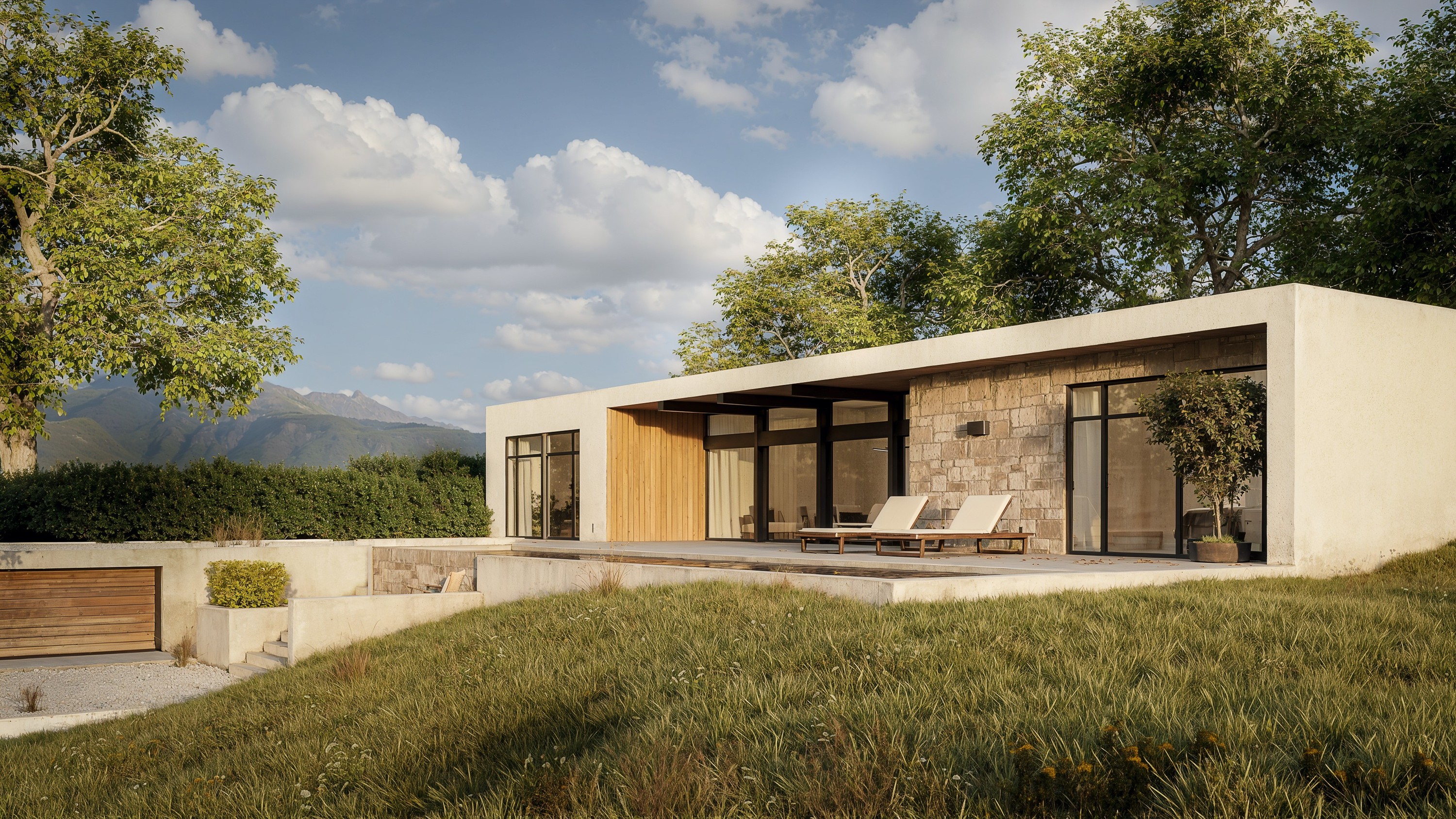 Wide landscape view of the stone pavilion residence