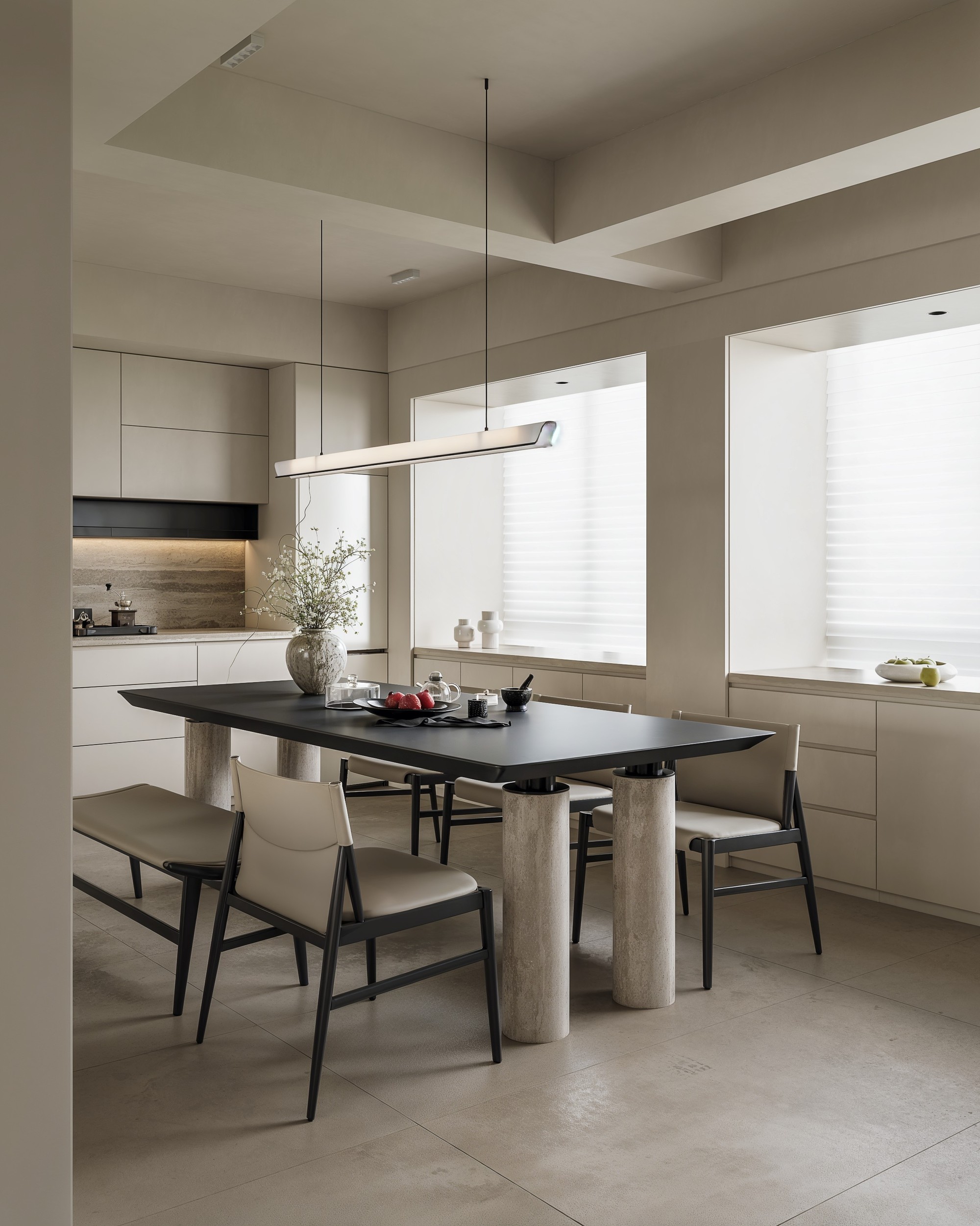 Dining area with pale stone and timber