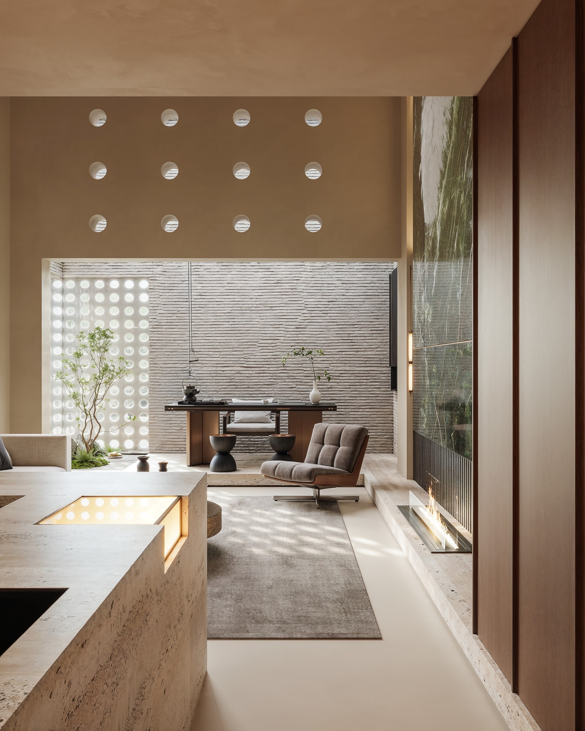 Lower-level spatial view with perforated daylight wall